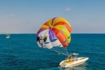 a parachute with a body of water